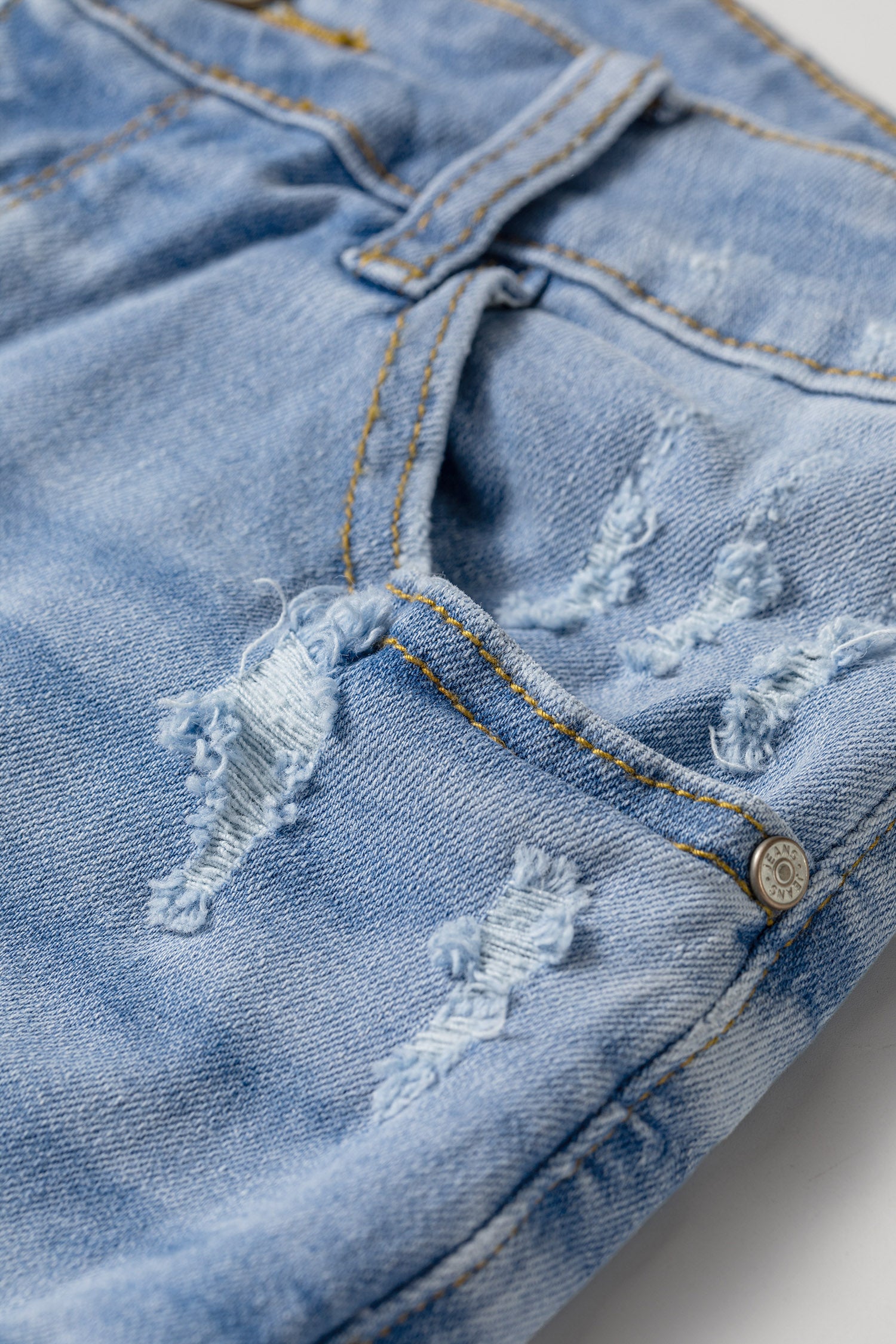 *Beau Blue Asymmetric Raw Hem Distressed Whiskery Denim Shorts
