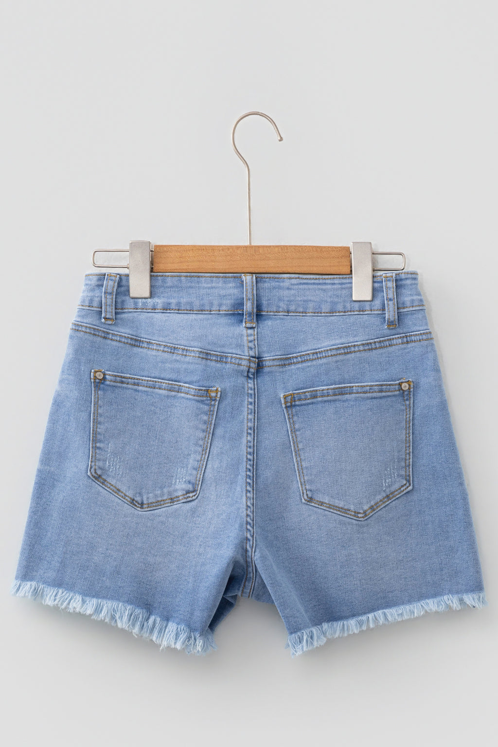 *Beau Blue Asymmetric Raw Hem Distressed Whiskery Denim Shorts