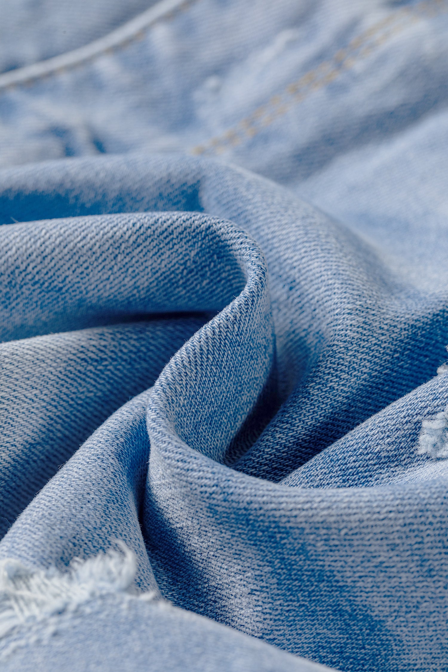 *Beau Blue Asymmetric Raw Hem Distressed Whiskery Denim Shorts
